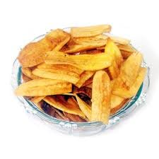 Paithrka long banana chips served in a rustic wooden bowl, featuring crispy golden to deep brown fried banana slices on a natural wooden table.