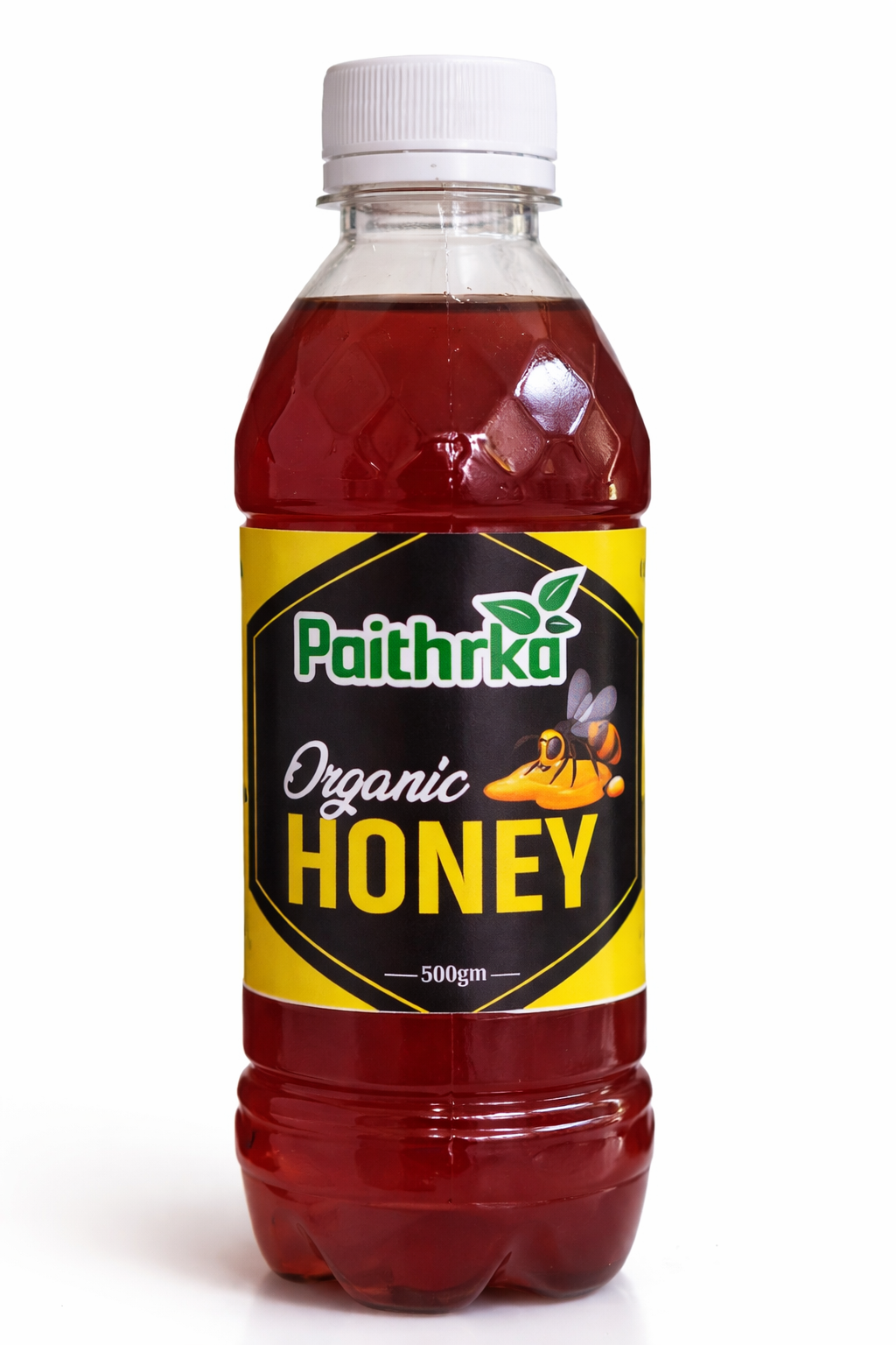 Paithrka Organic Honey 500gm in a clear plastic bottle with yellow and black label and a bee illustration